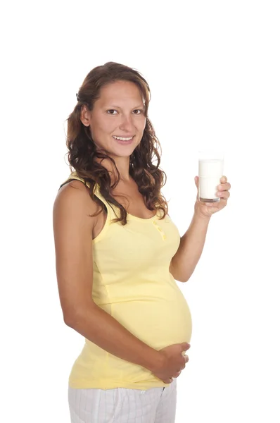 Kobieta w ciąży z mlekiem — Zdjęcie stockowe