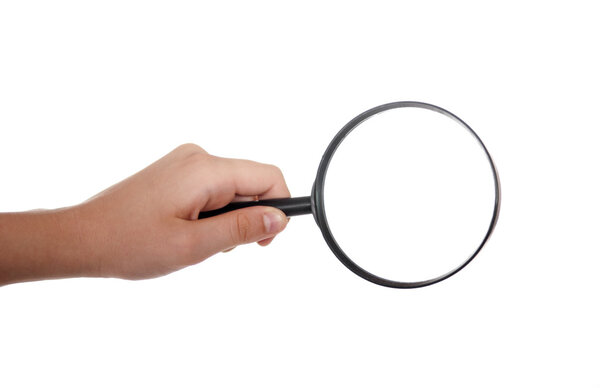 Hand with magnifying glass against white background