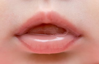 Close up of lips of baby girl clipart