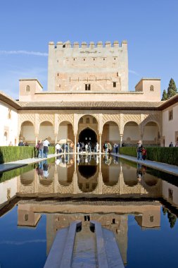 Ancient tower in the Alhambra Palace in spain clipart