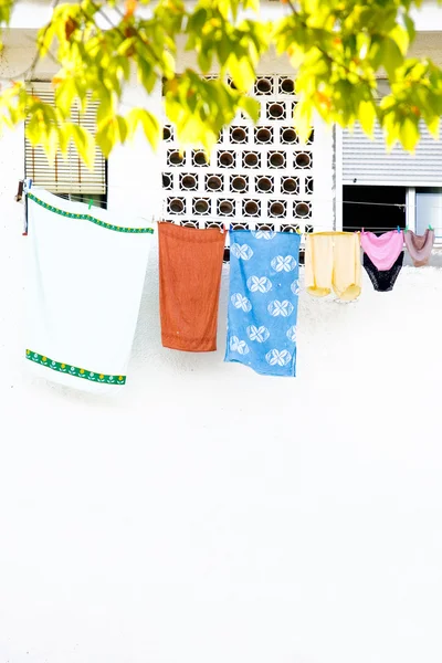 stock image Washing hanging from windows in Spain