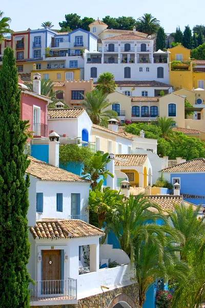 Colorful Spanish pueblo on hillside — Stock Photo, Image