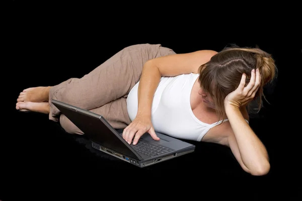 stock image Pregnant woman surfing the net