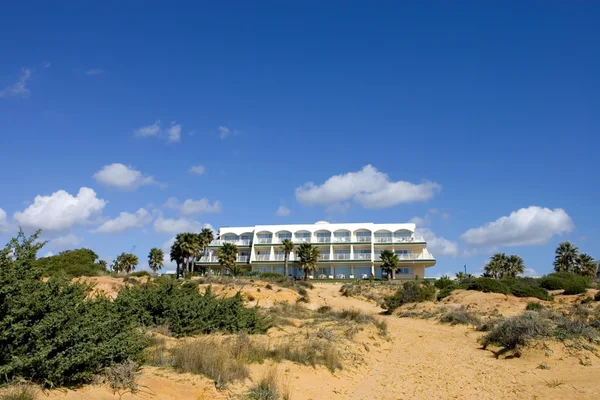 Luxury white Spanish hotel on the beach — Stock Photo, Image