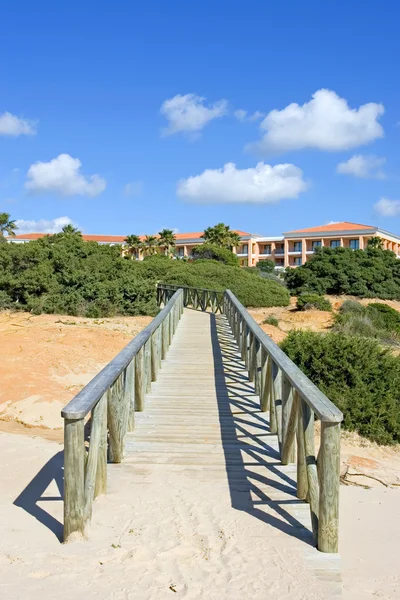 Wooden walkway on sandy beach in Spain — Stock Photo, Image