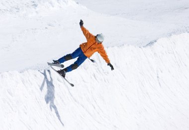 Skier on half pipe of Prodollano ski resort in Spain clipart