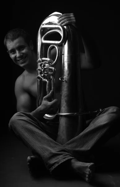 Man and woodwinds. — Stock Photo, Image