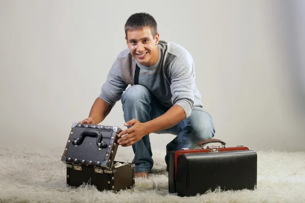 A man and a suitcase. — Stock Photo, Image