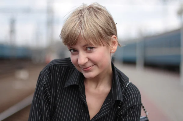 stock image The girl at railway station.