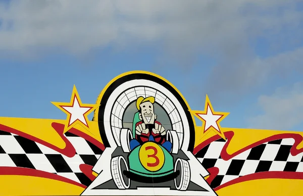 Parque de diversões Racing Sign — Fotografia de Stock