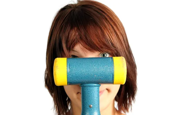 Girl with hammer — Stock Photo, Image