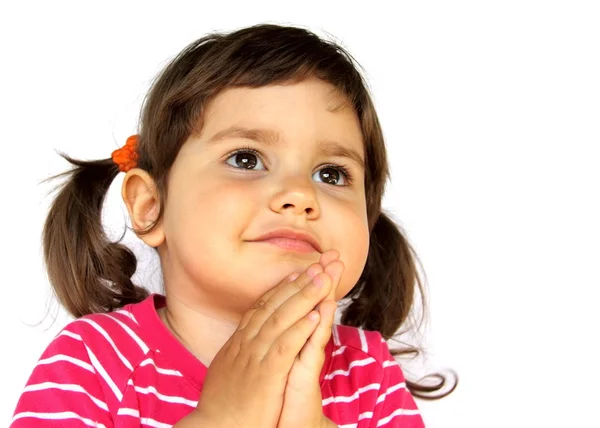 Kleines Mädchen, das betet oder einen Wunsch äußert — Stockfoto