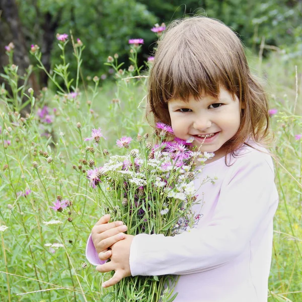 Adorable Girl with Bunch of Flowers