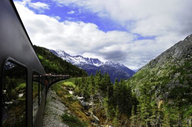 Vintage Train out of Skagway Alaska clipart