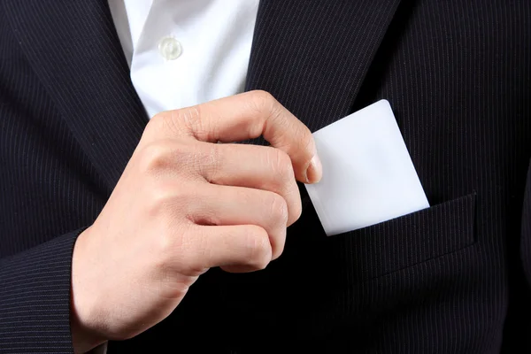 Podnikatel drží kartu — Stock fotografie
