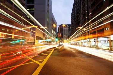 Traffic in downtown at night clipart