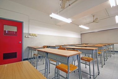 Empty big classroom at school clipart