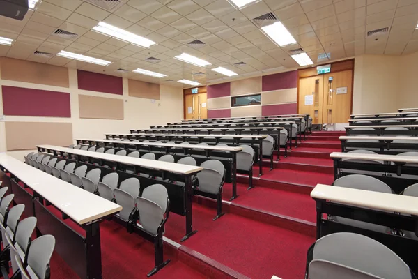 Empty hall for presentation with grey armchairs — Stock Photo, Image