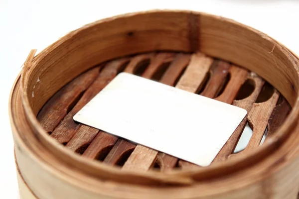 White card in chinese bamboo steamer — Stock Photo, Image