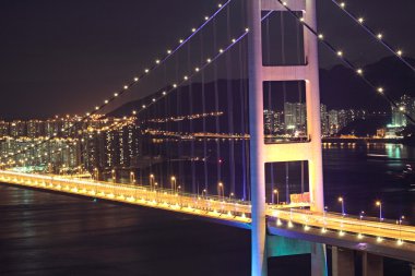 Beautiful night scenes of Tsing Ma Bridge in Hong Kong. clipart