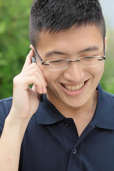 Asia man talking on phone — Stock Photo, Image