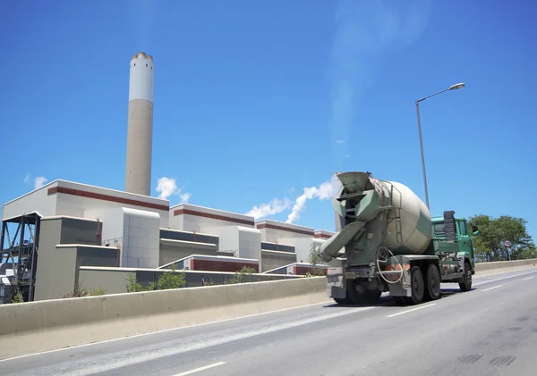 Coal fired power station and car moving — Stock Photo, Image