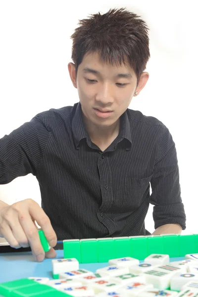 Chinese man play Mahjong, traditional China gamble. — Stock Photo, Image