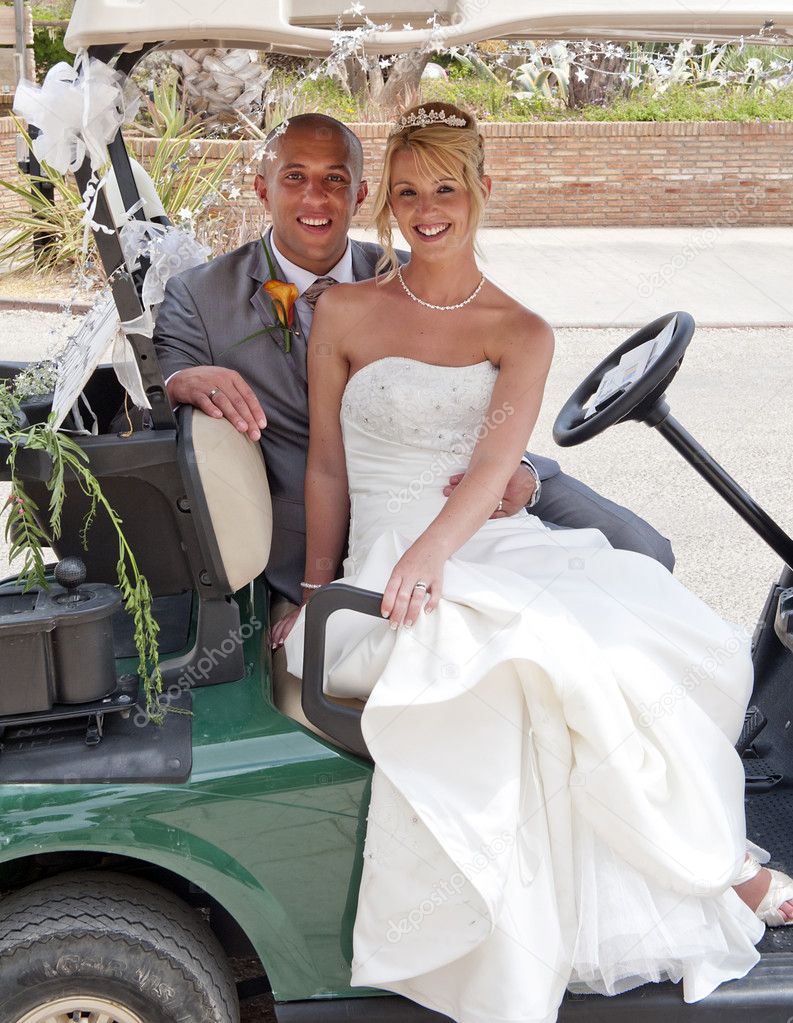 Bride and Groom in a Golf Cart