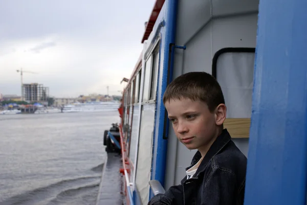 stock image The boy by the ship