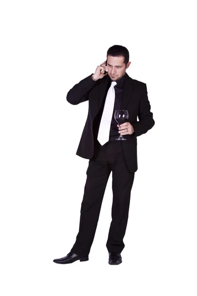 Бизнесмен празднует с бокалом вина — стоковое фото