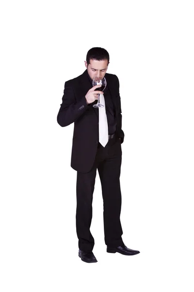 Бизнесмен тестирует бокал вина — стоковое фото