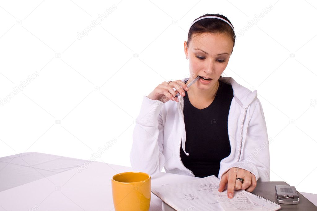Teen Girl Paying Bills and Making a To Do List