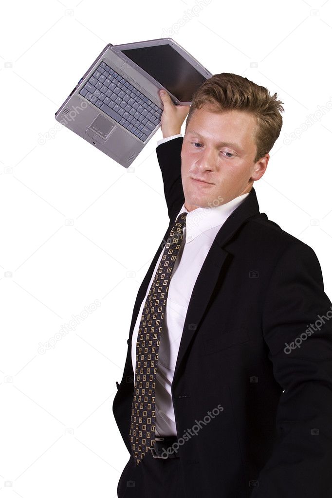 Frustrated Young Casual Businessman Working at his Desk