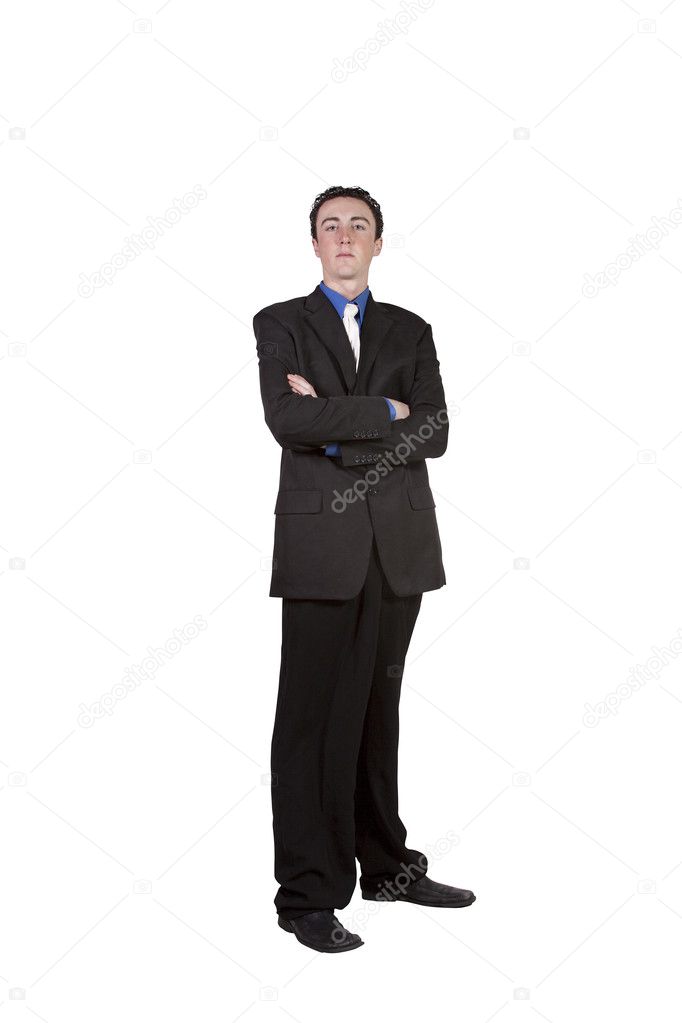 Close up of well dressed businessman with crossed arms