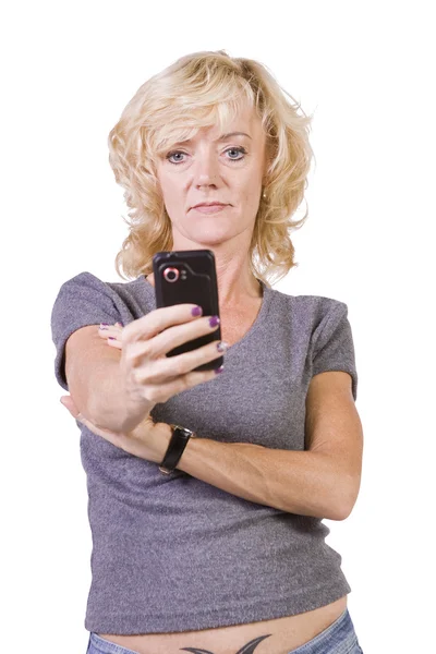 Hermosa mujer sosteniendo un teléfono celular —  Fotos de Stock