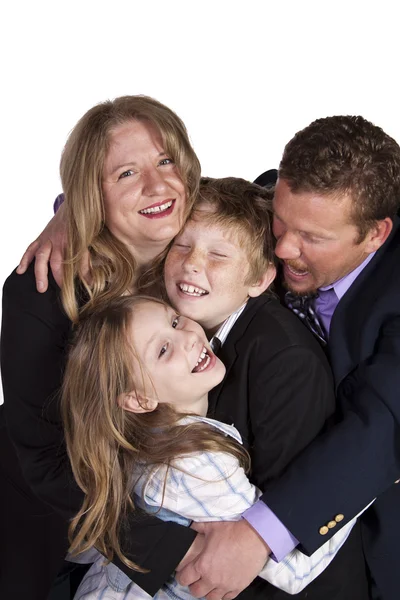 Linda familia posando sobre fondo blanco — Foto de Stock