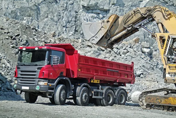 Dump Truck and Excavator in a Quarry — Stock Photo, Image
