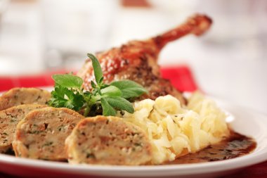 Roast Duck with Cabbage and Bread Dumplings clipart