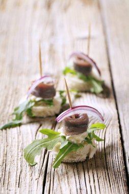 Anchovy canapes clipart