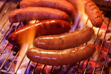 Grilling bratwursts clipart