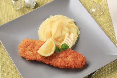 Fried fish and mashed potato clipart