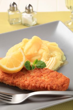 Fried fish and mashed potato clipart