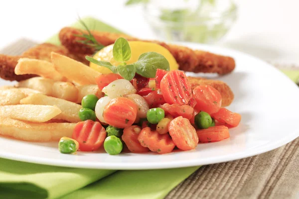 Mixed vegetables and French fries — Stock Photo, Image