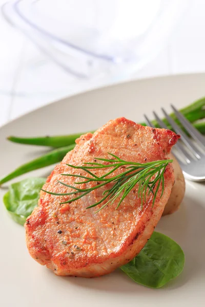 Gemarineerde pork chop en groenten — Stockfoto