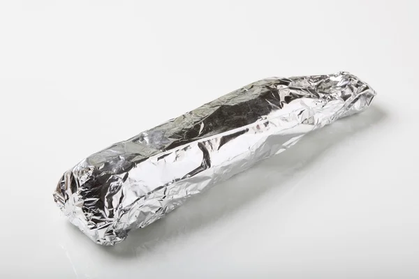 stock image Tenderloin wrapped in aluminum foil