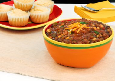 Large, colorful bowl of vegetarian chili clipart