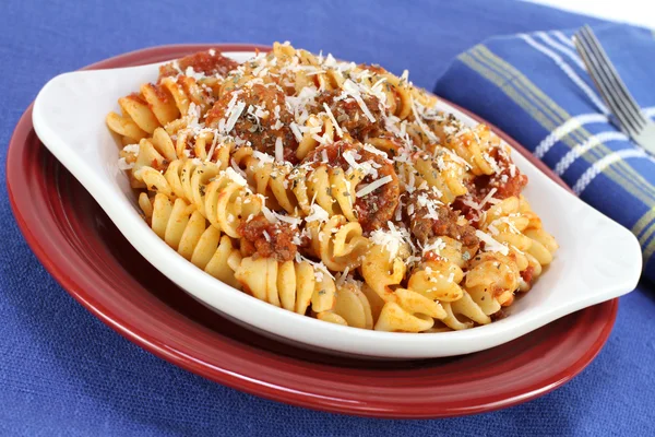 Baked spriral rotelle pasta in meat sauce — Stock Photo, Image
