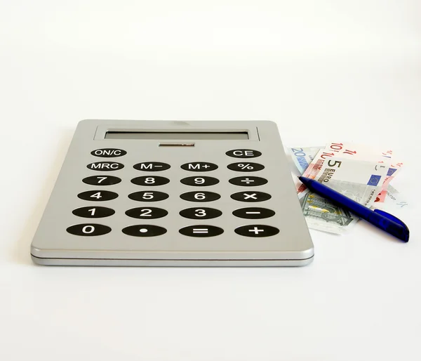 Una calculadora muy grande sobre un fondo blanco — Foto de Stock