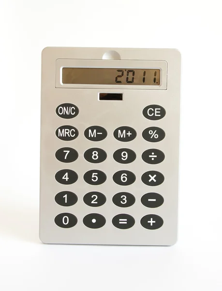 Uma calculadora muito grande sobre um fundo branco — Fotografia de Stock