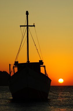 Fishing Boat at Sunset clipart